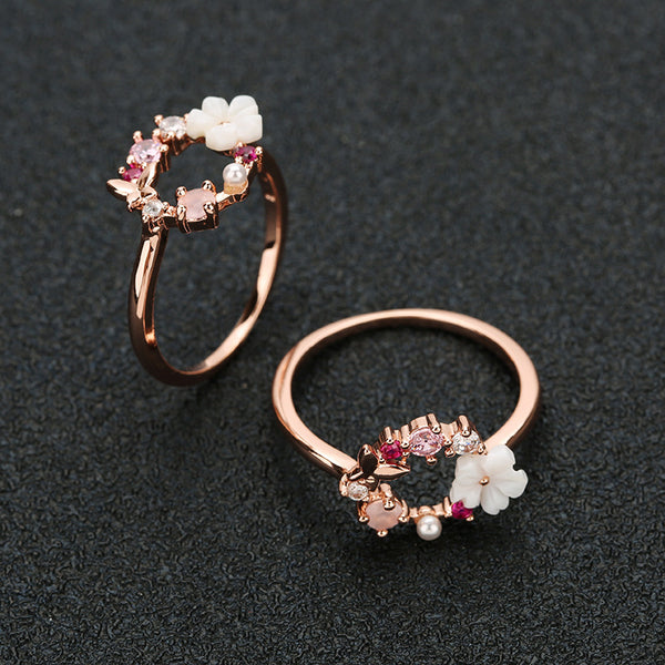 anillo rosado con flores 