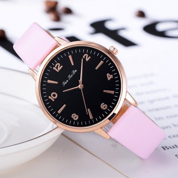 reloj rosa negro