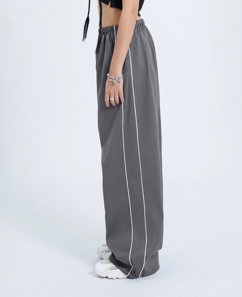 pantalon chandal gris tela plastico estilo antiguo pantalones anchos deporte