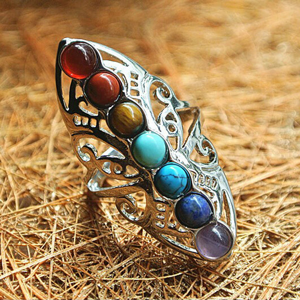 anillo con piedras de colores 