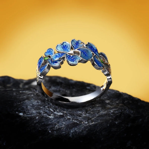 anillo plata flores azules