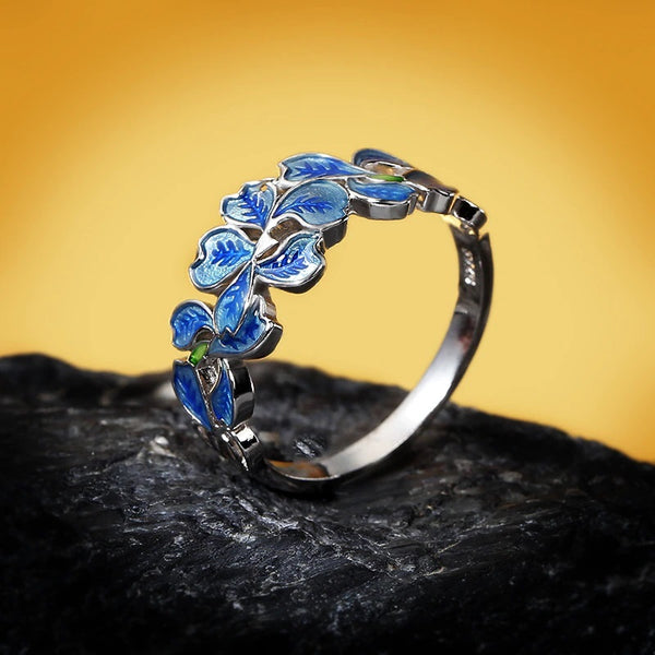 anillo plata flores azules