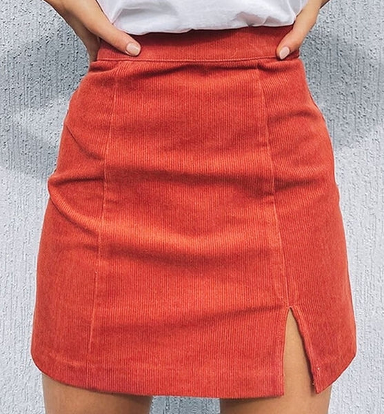 falda corta de pana naranja abertura
