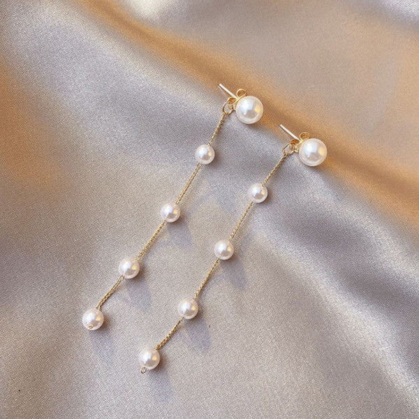 pendientes largos de perlas
