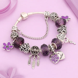 pulsera de charms morada rosa cristal