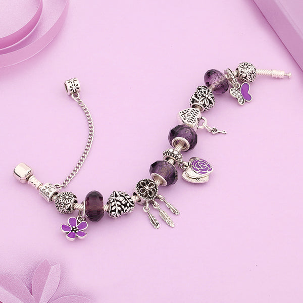 pulsera de charms morada rosa cristal