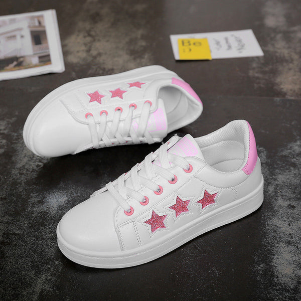 zapatillas blancas con estrellas